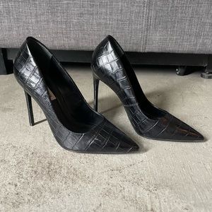 Steve Madden pointed toe black stilettos.